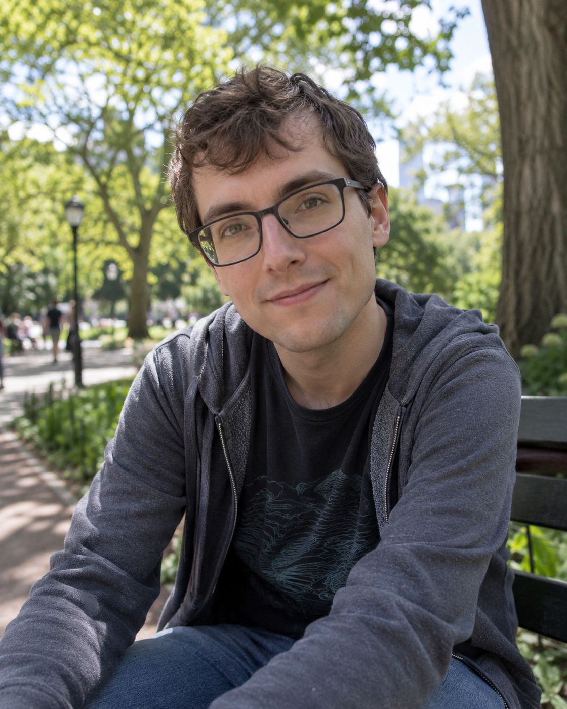 Illustrative portrait of a man with glasses sitting on a park bench